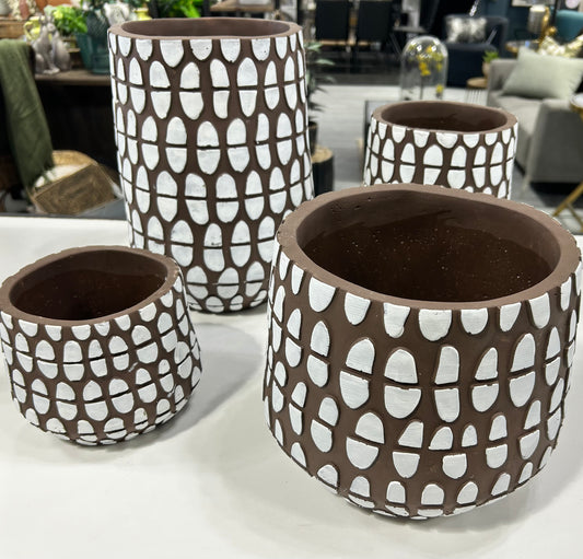 Brown pot with white spots